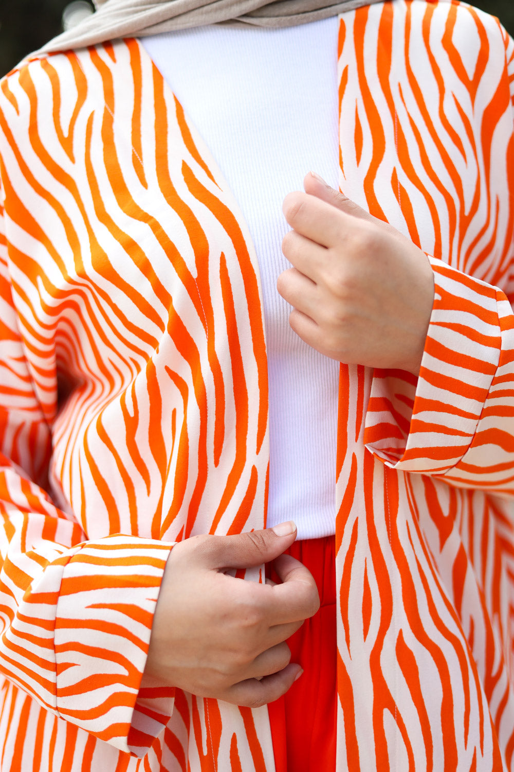 Zebra printed orange cardigan